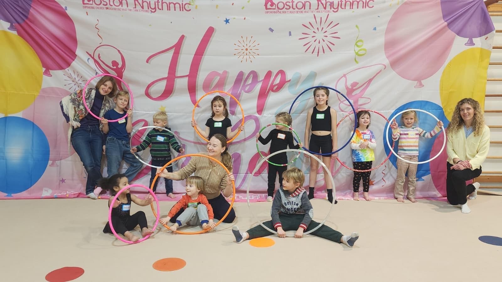 Children celebrating with hoops at a Boston Rhythmic birthday party