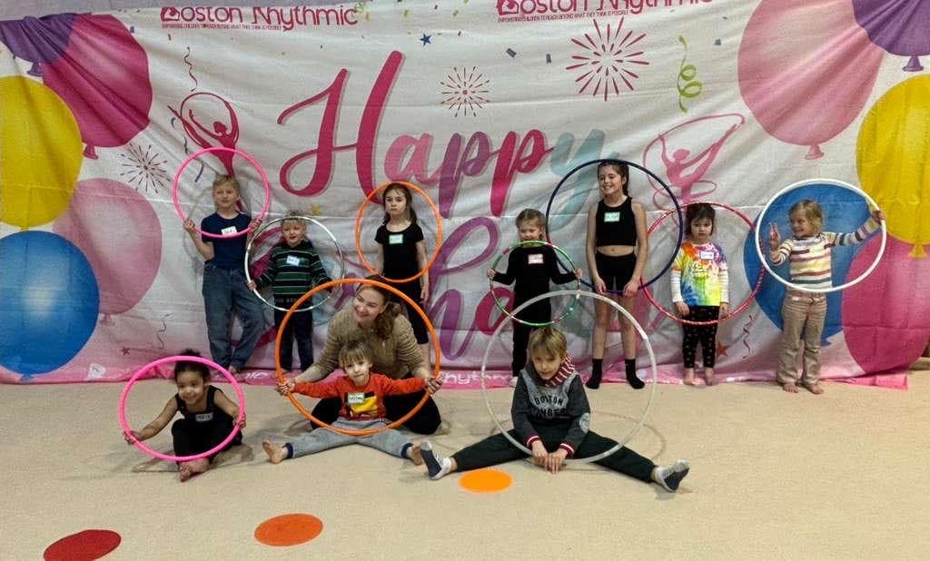 Group of children with hoops at a Boston Rhythmic party