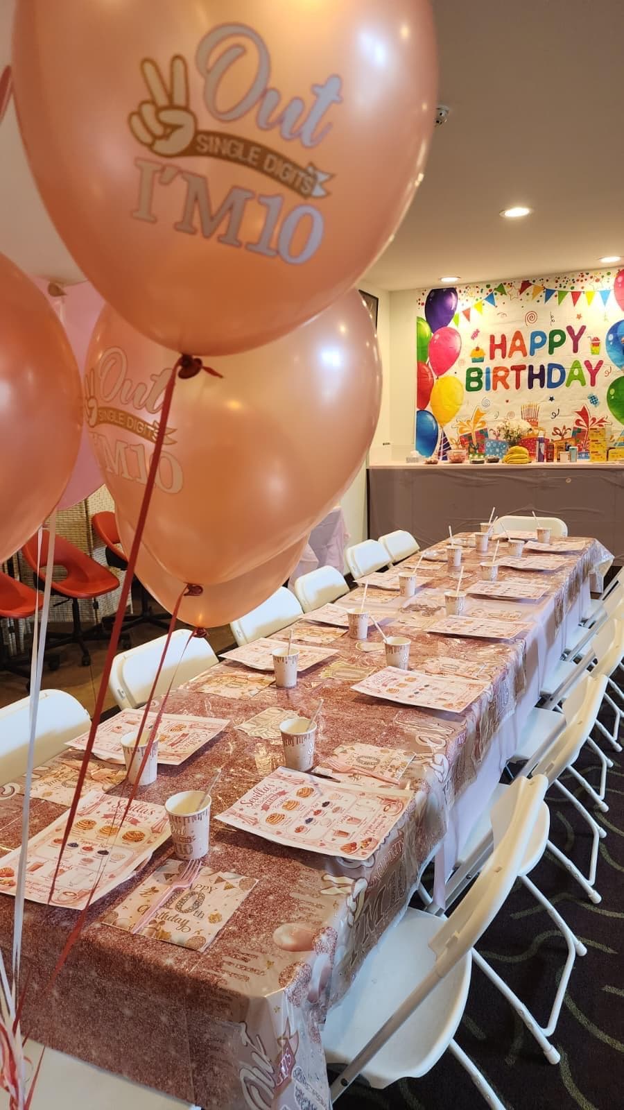 Party table setup with balloons
